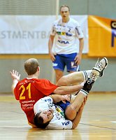27.02.2010<br>UHK Krems - HC Hard/30:29 (15:13)<br>SCHMOELZ Johann; KNAUTH Michael, TLUCZYNSKI Maciej (im Hintergrund)